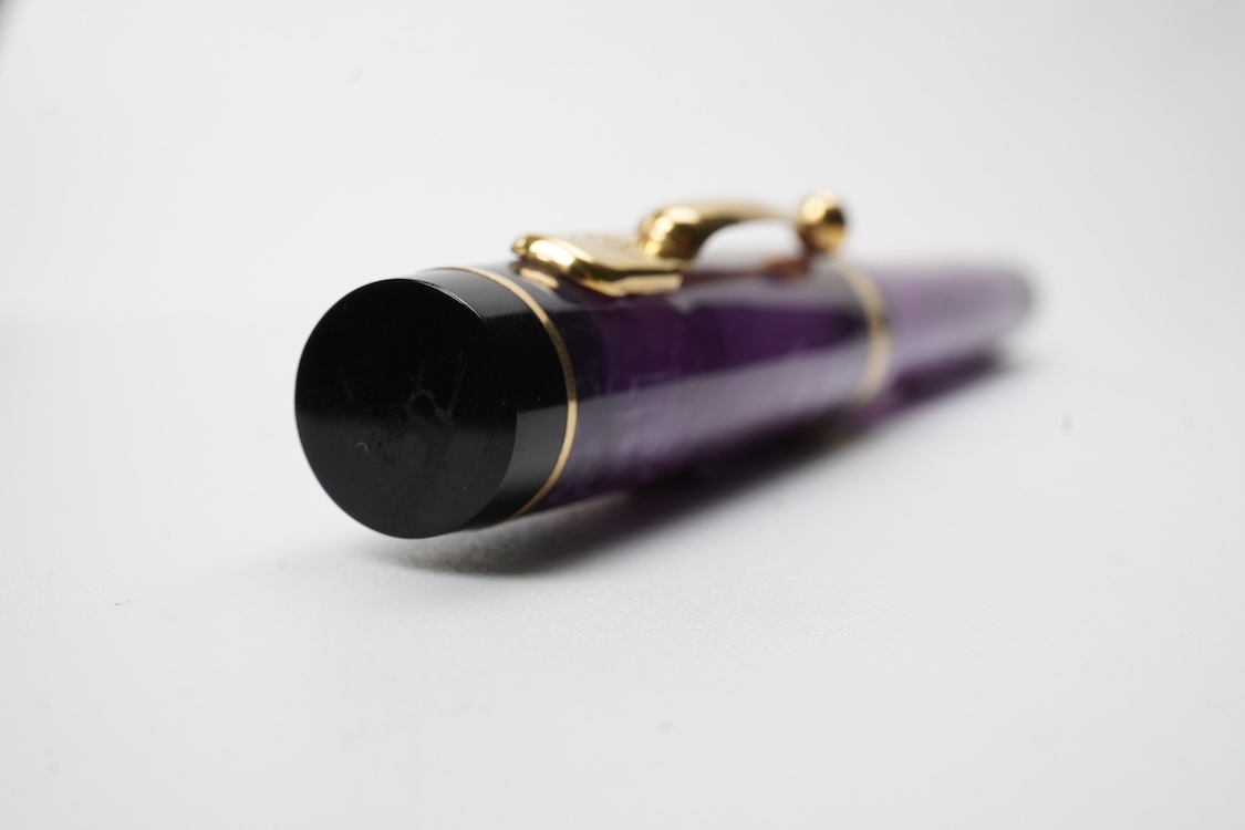 A modern Conway Stewart 'Duro' in stunning purple fitted with 18ct. gold medium nib
